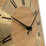 Natuhr Tischuhr Eiche Holz - Knick - Massivholz Design - goldener Metall Zahlenreif